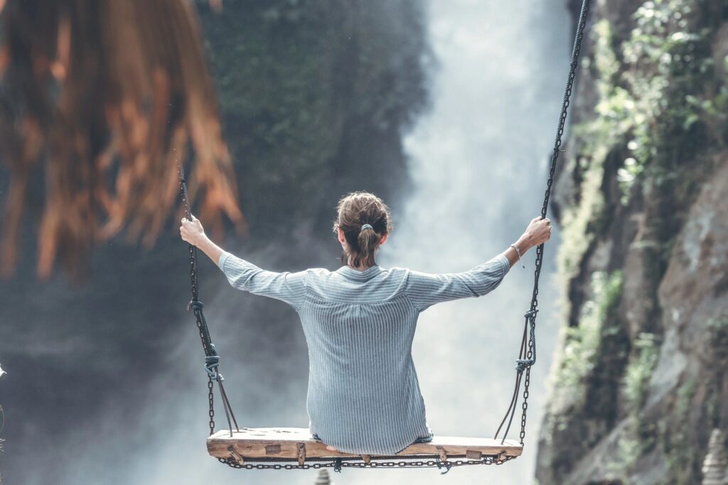 woman on swing return to calm image
